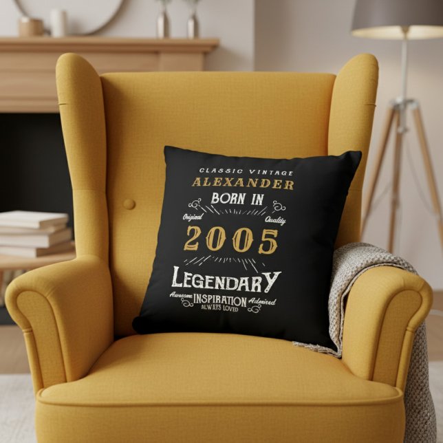 Coussin Anniversaire 21 Ans Personnalisé Né en 2005 Légend (Born 2005 throw pillow on a yellow chair.)