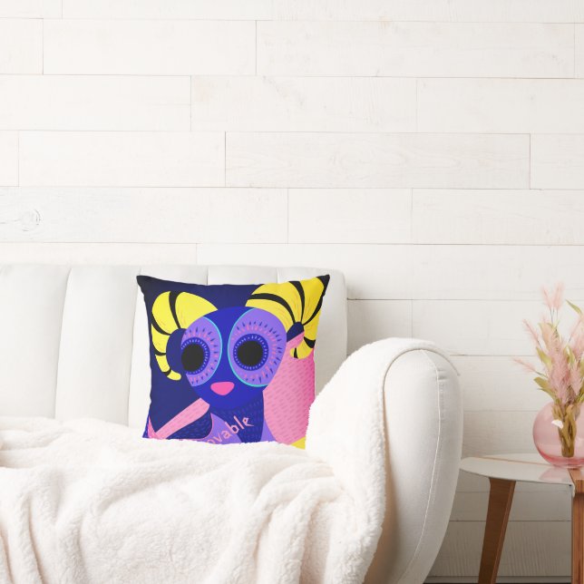 Coussin art populaire mexicain rose et bleu sur (Canapé)