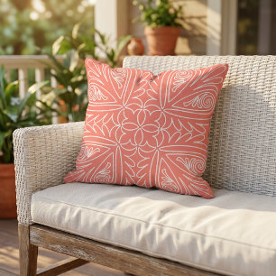 Coussin Art tribal floral blanc sur fond corail rouge oran