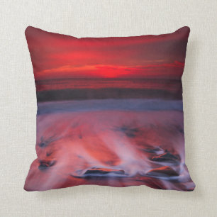 Coussin Aube au-dessus de la mer orageuse