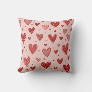 Coussin avec beaucoup de logos cardiaques