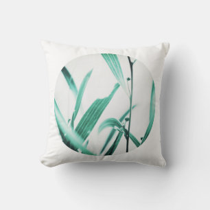 Coussin avec feuilles vert pâle d'Acacia à yeux ro