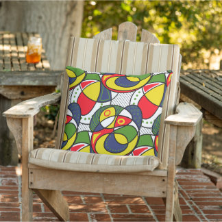 Coussin Bal de plage rouge jaune bleu vert