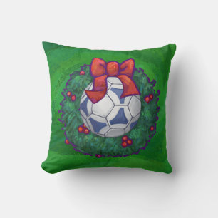 Coussin Bal de soccer blanc et bleu sur vert