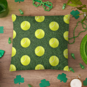 Coussin Balle de tennis sur de l'herbe verte