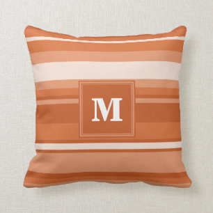 Coussin Bandes orange monogrammes