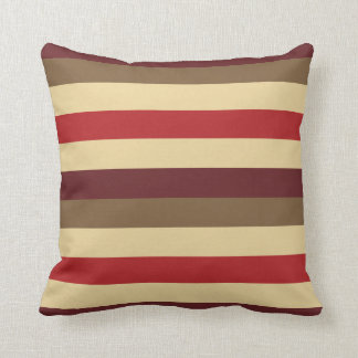 Coussin barré par rouges chauds