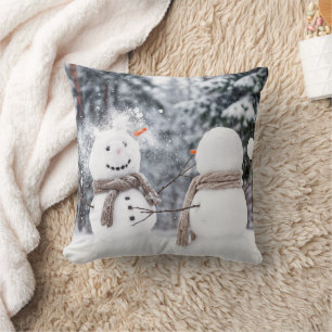 Coussin Bataille de boules de neige entre bonshommes de ne