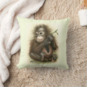 Coussin Bébé orang-outan avec des feuilles (Couverture)