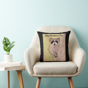 Coussin Bébé Raccoon dans un arbre