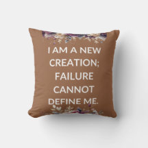 Beige pillow with a simple religious quote
