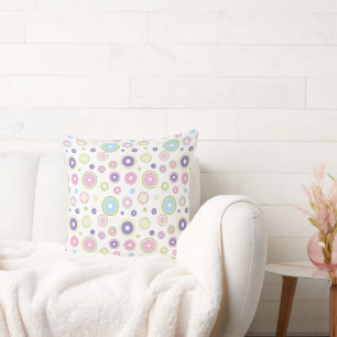 Coussin Belle motif circulaire aux couleurs pastel.