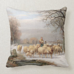 Coussin Bergère avec son troupeau dans un paysage d'hiver