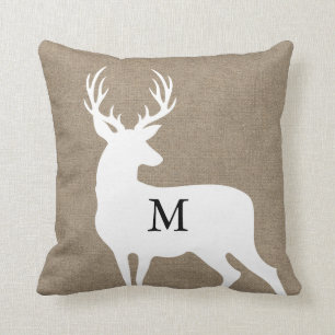 Coussin blanc de monogramme de silhouette de cerfs