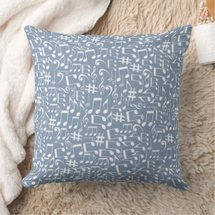 Coussin Bleu fumé clair avec des notes de musique dansante
