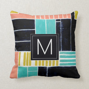 Coussin Blocs géométriques du monogramme  