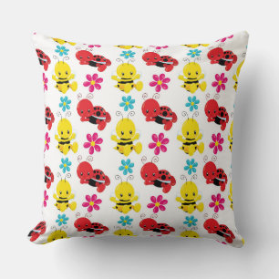 COUSSIN BOGUES ET FLEURS DE BÉBÉ ROUGE ET JAUNE