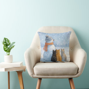 Coussin Bonhommes de neige et chats dans un champ enneigé
