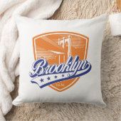 Coussin Bouclier Brooklyn avec Swoosh Design (Couverture)