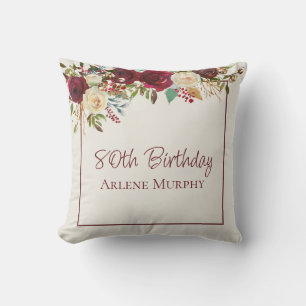 Coussin Bourgogne et Rose de crème 80e anniversaire