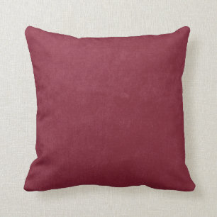 Coussin Bourgogne rouge foncé a poncé l'arrière - plan