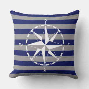 Coussin Boussole nautique élégante sur fond rayé bleu