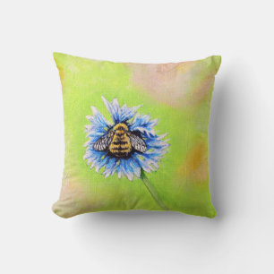 Coussin Bumble Bee sur une peinture à fleurs