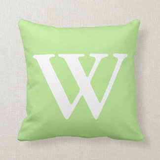 Coussin Carreau décoré d'un monogramme blanc vert en bon