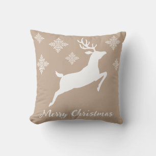 Coussin Cerf Sautant Blanc Sur Fond Beige Avec Flocons De