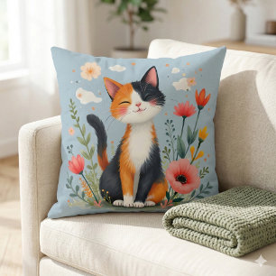 Coussin Chat Calico souriant dans le jardin fleuri