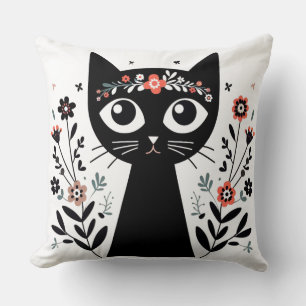 Coussin Chat noir aux grands yeux entouré de fleurs