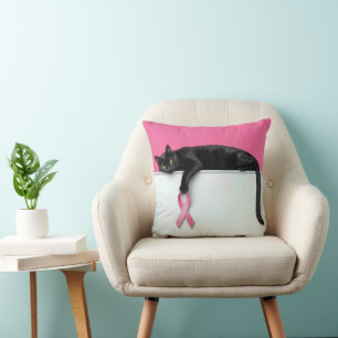 Coussin Chat noir avec un ruban de sensibilisation au canc