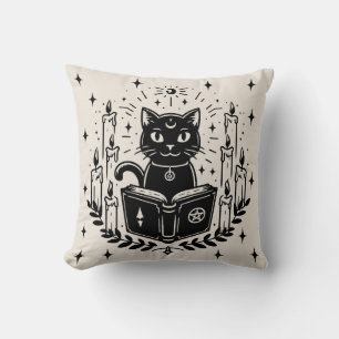 Coussin Chat noir lisant un livre épouvantable