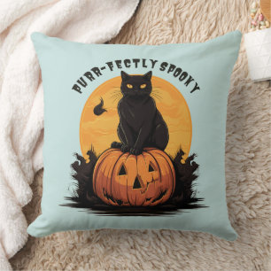 Coussin Chat noir parfaitement effrayant sur un citrouille