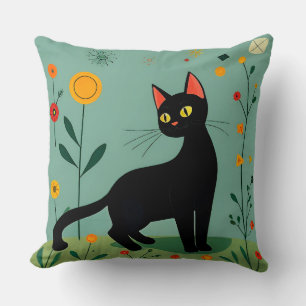 Coussin Chat noir parmi des fleurs vibrantes