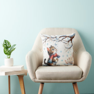 Coussin Chaton regardant la neige tomber d'une branche