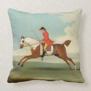 Coussin Cheval de course galopant et jockey monté en roug