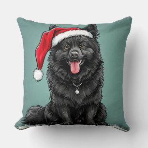 Coussin Chien noir adorable portant un chapeau de Père Noë