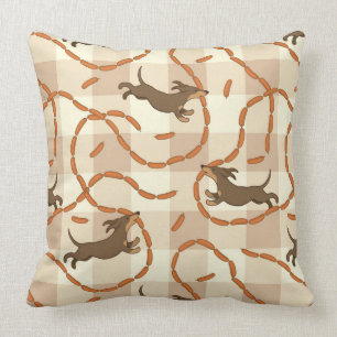 Coussin chiens chanceux avec l'arrière - plan de saucisse