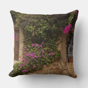 Coussin Cité Monumentale, bâtiments couverts de fleurs