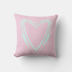 Coussin Cœur bleu clair avec fond rose pastel
