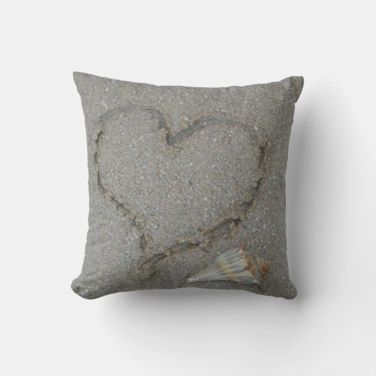 Coussin coeur dans le sable avec coquille (Recto)
