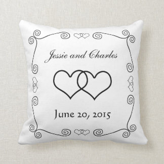 Coussin Coeurs enclenchés - noirs et blancs