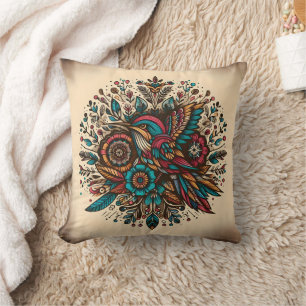 Coussin Colibri vibrant parmi les motifs floraux à la tomb