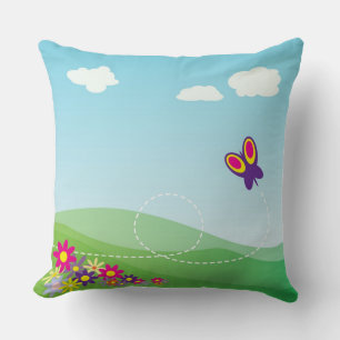 COUSSIN COLLINE AVEC BOUTEILLE ET FLEURS