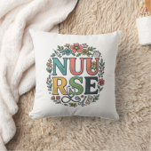 Coussin Conception de chemise d'infirmière florale Art méd (Couverture)