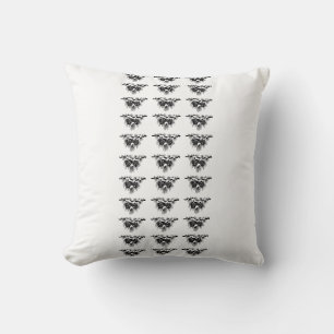 Coussin cônes de pin noir et blanc