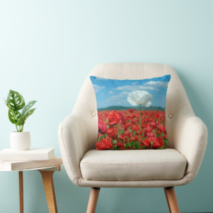 Coussin Coquelicot blanc unique dans un champ de coquelico