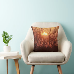 Coussin Coucher de soleil derrière les arbres