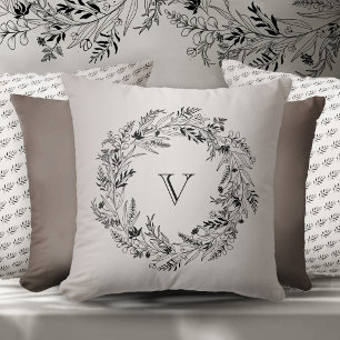 Coussin Couronne de feuilles noires gracieuse lettre V